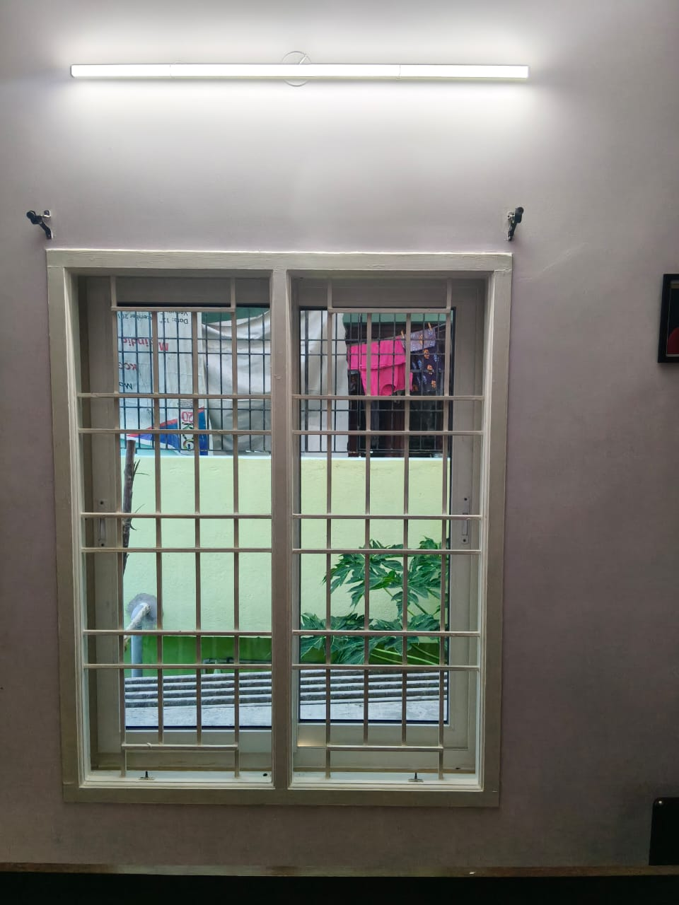 UPVC Casement Window - White Frame with Horizontal Safety Grills