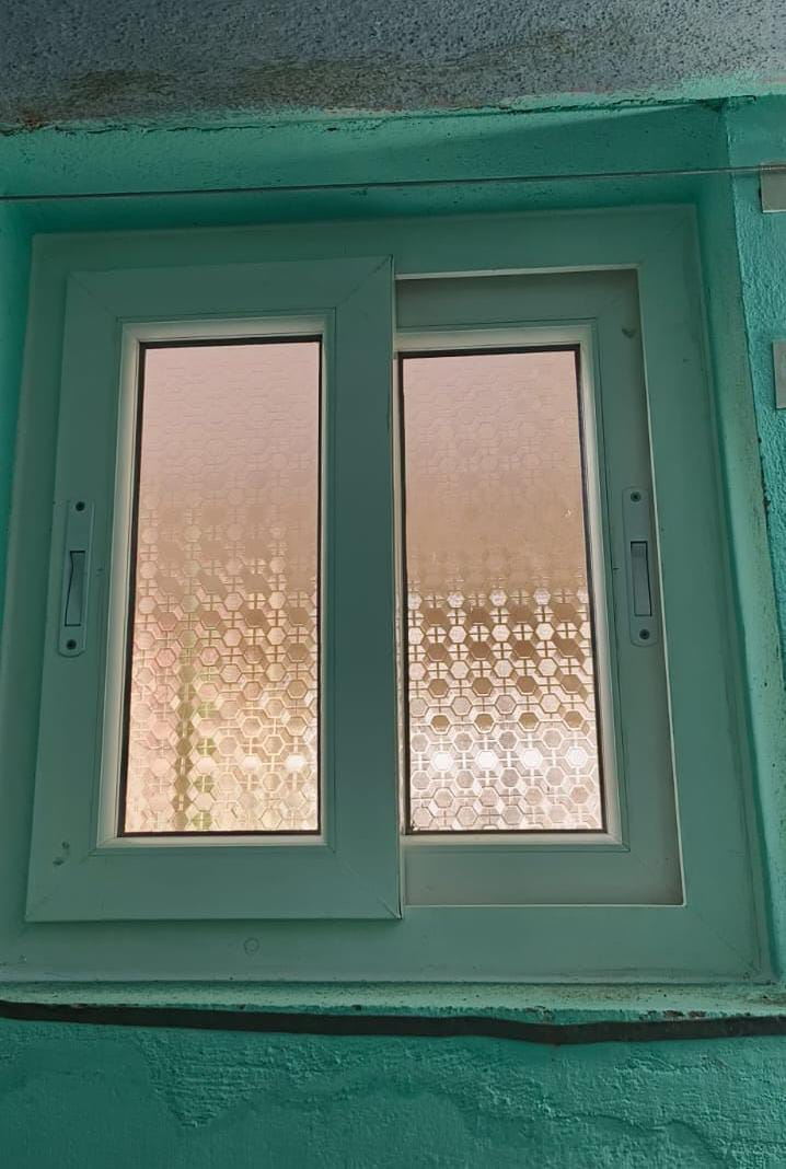 UPVC Casement Window - Turquoise Frame with Frosted Privacy Glass